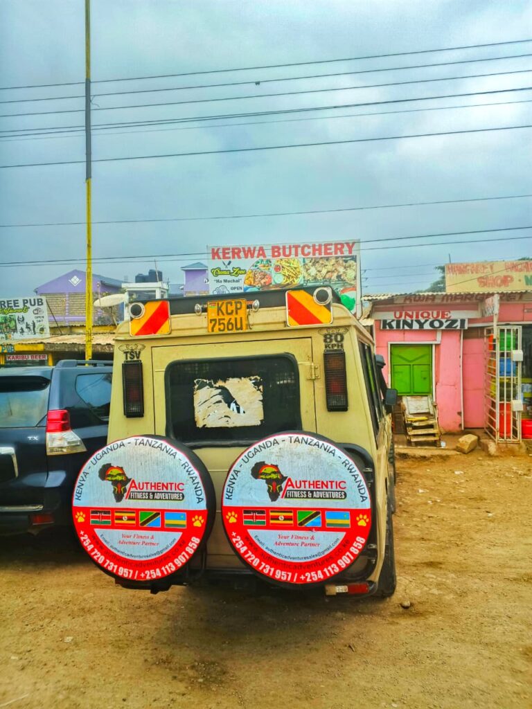 Authentic Adventures safari vehicle on the road