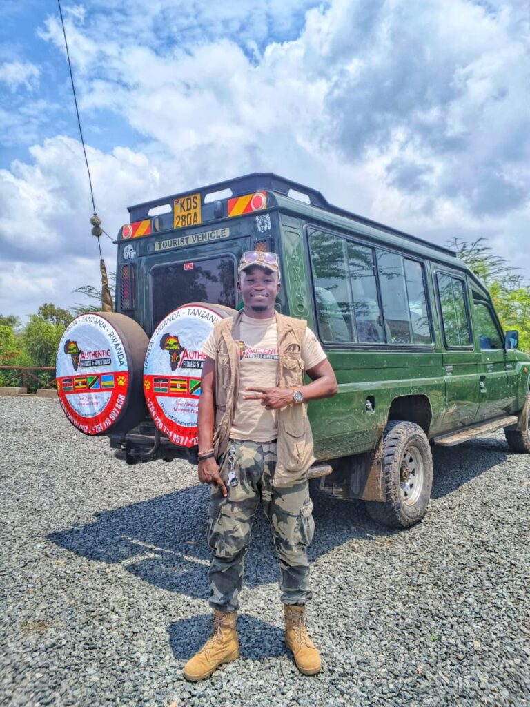 Guide beside an Authentic Adventures Land Cruiser