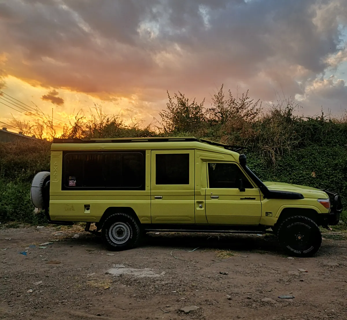 Safari Land Cruiser at sunset