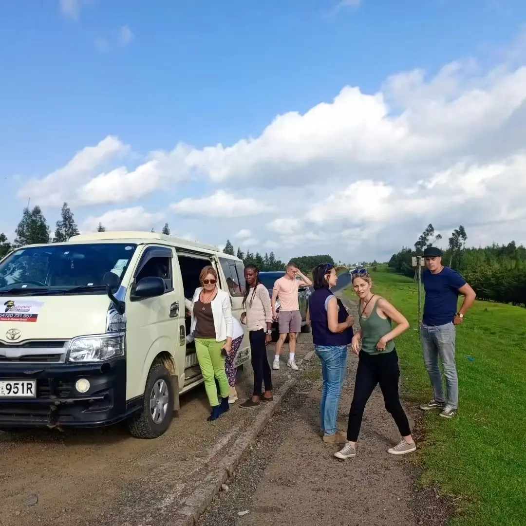 Guests on a road trip during their safari