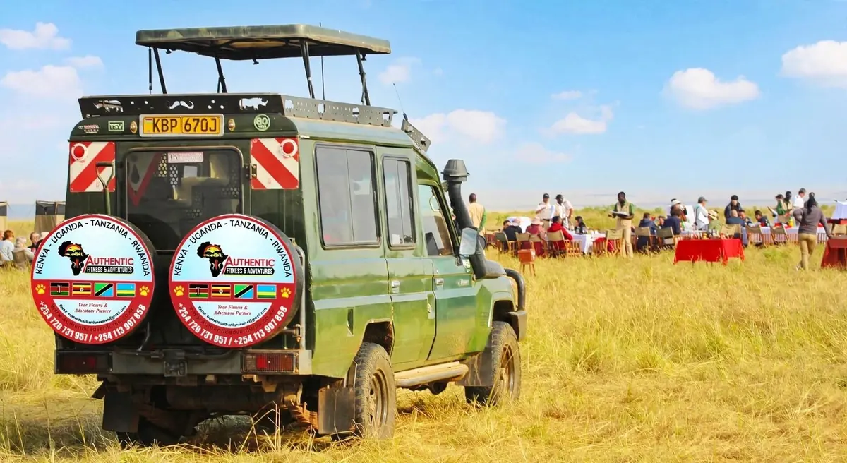 Bush breakfast beside the Land Cruiser in the Mara